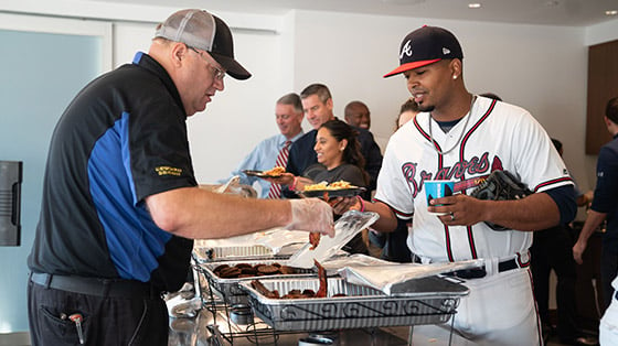 Atlanta Braves player being served at Waffle House event