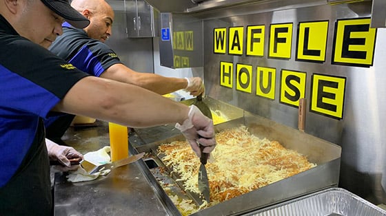 Hashbrowns cooking inside Waffle House food truck